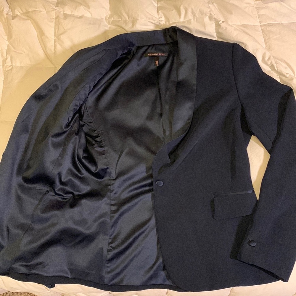 Victoria’s Secret navy blue blazer, satin collar, trim and lining. Size 12.